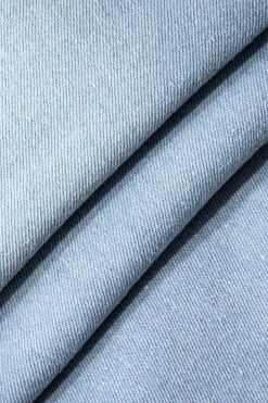 MICAS Skirts-Asymmetrical Ripped Denim Midi Skirt LIGHT WASH BLUE