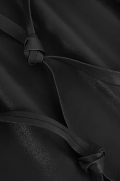 MICAS Skirts-Faux Leather Braiding Fringe Mini Skirt